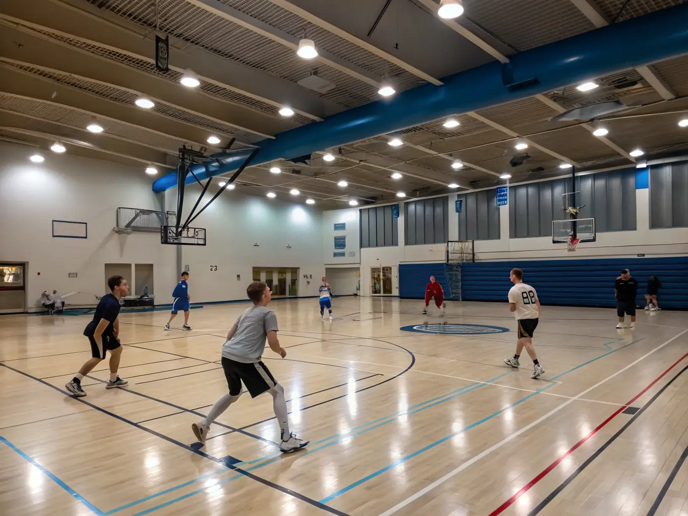 Students collaborating during a basketball game, demonstrating teamwork and strategic thinking at ETOILE SPORTIVE SEILHACOISE.